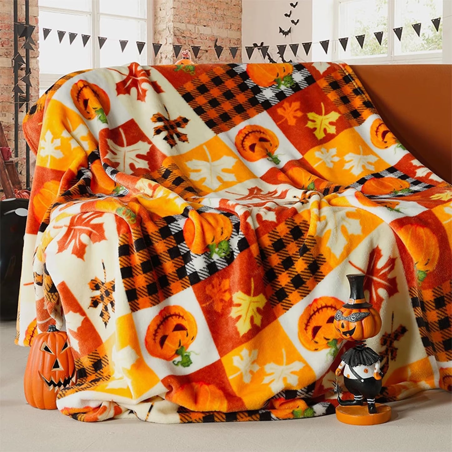 couverture polaire à motifs citrouilles et feuilles