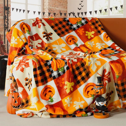 couverture polaire à motifs citrouilles et feuilles
