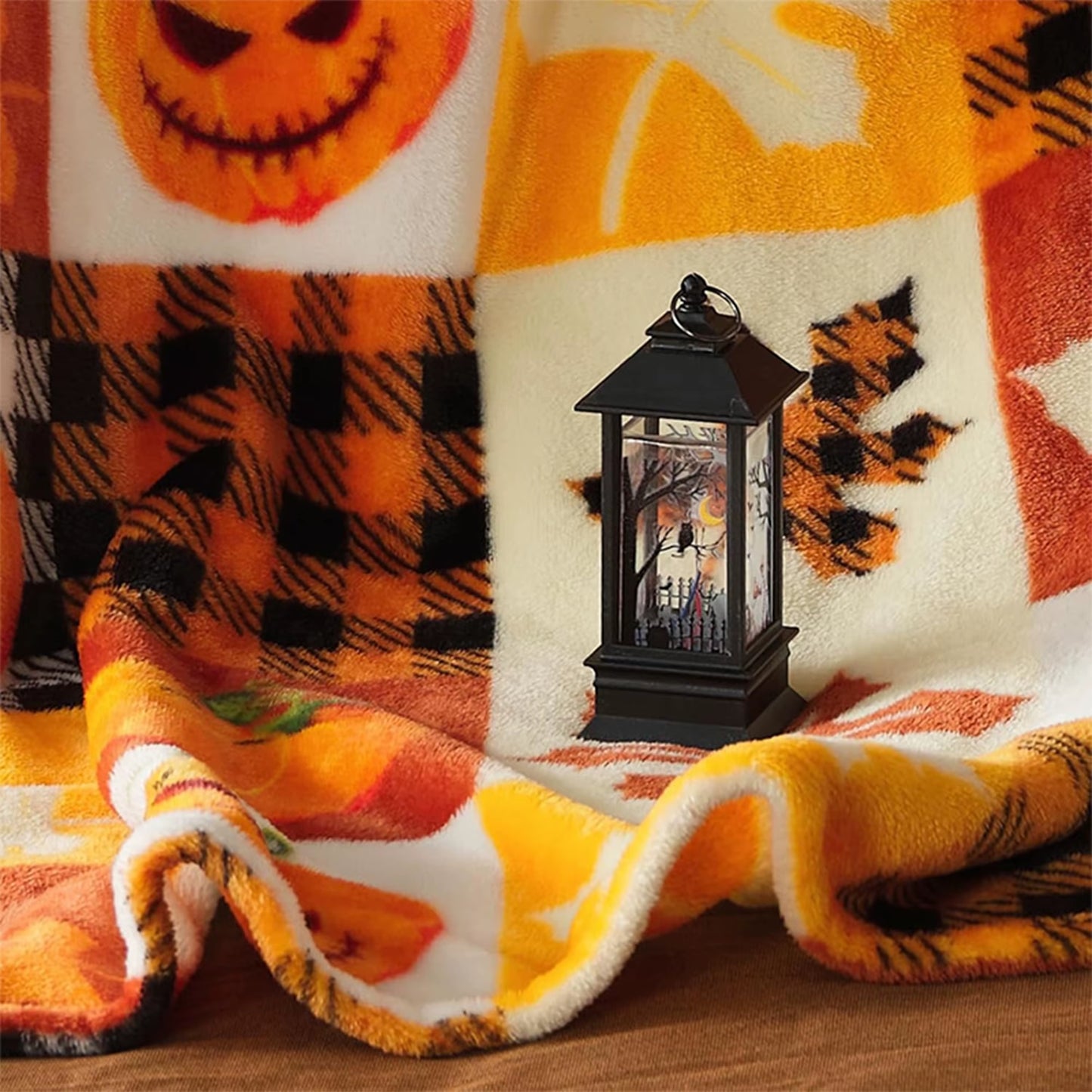 couverture polaire à motifs citrouilles et feuilles