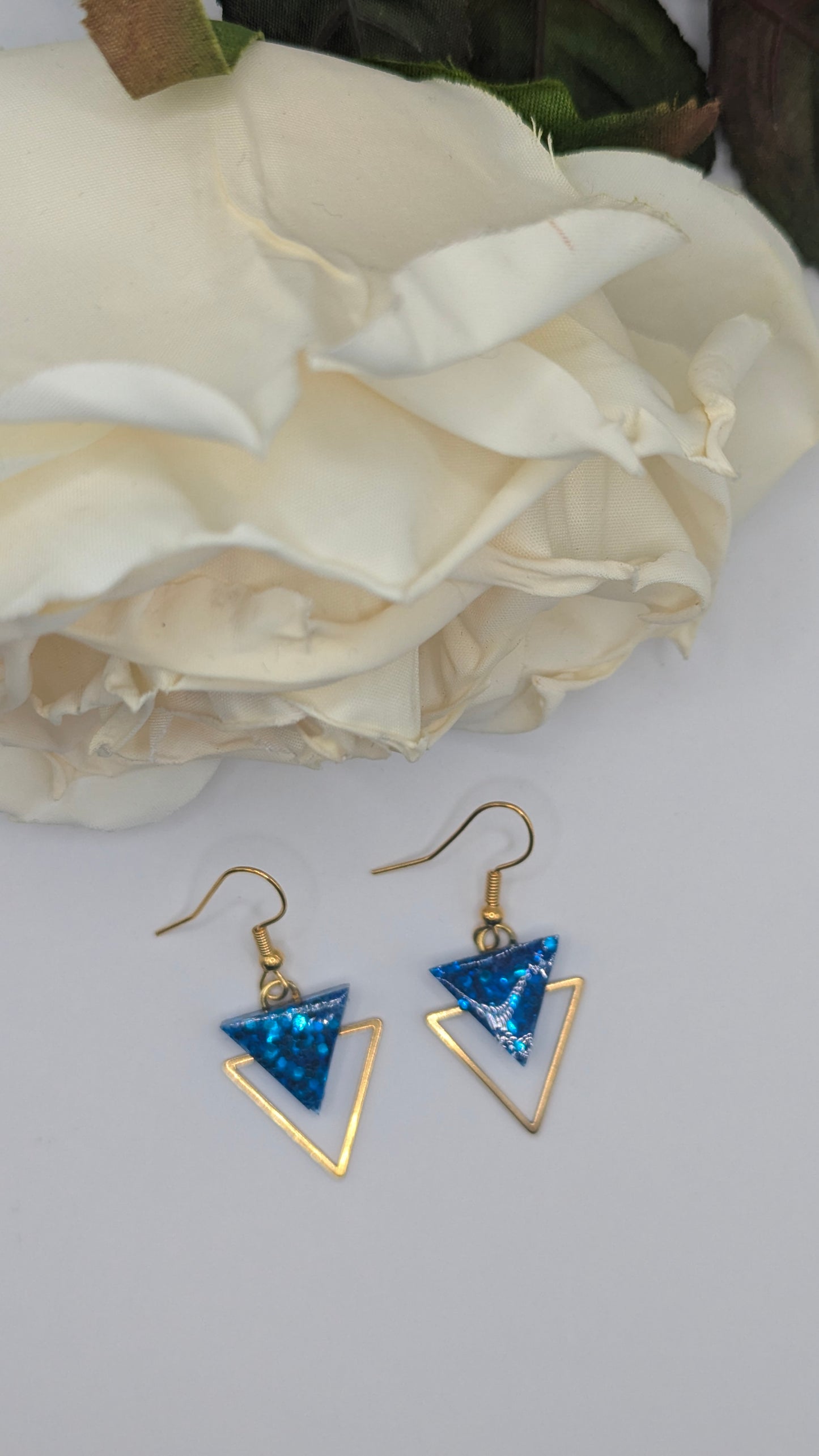 Triangle Électrique, Boucles d'oreilles en résine